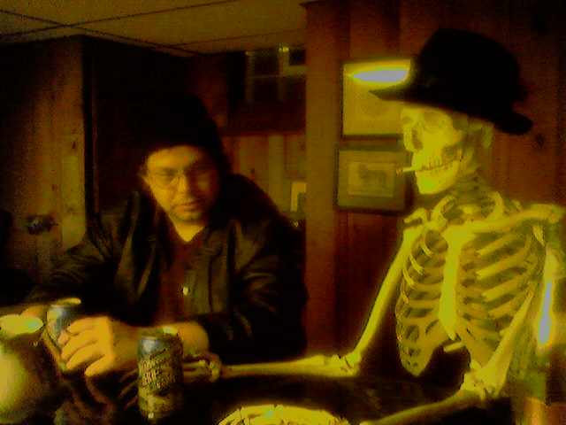 Donnie Love sitting at a bar talking to a skeleton